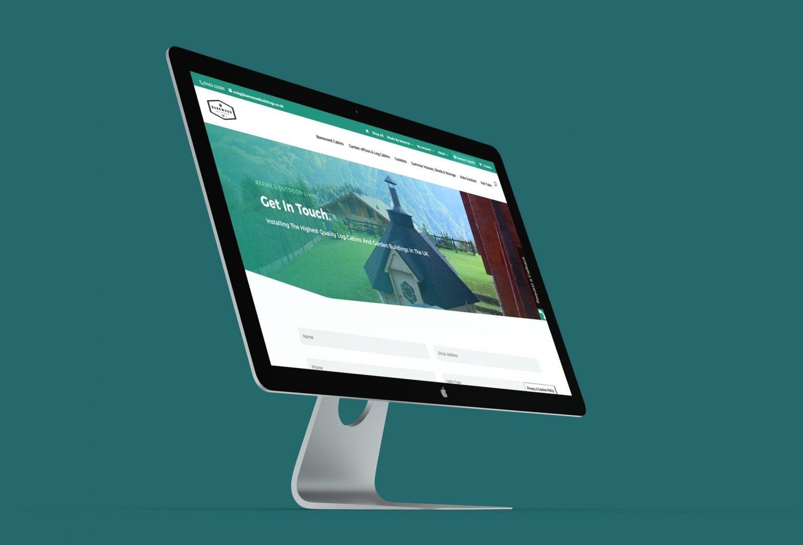 | Gloucester & Cheltenham | iMac Mockup barewood scaled | Gloucester & Cheltenham | iMac Mockup barewood scaled